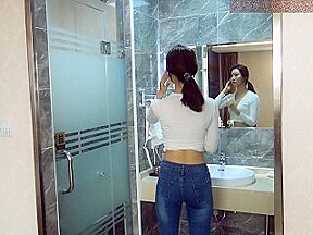 Chinese ballbust in tight jeans